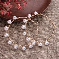Pearls Wrapped Around The Earrings