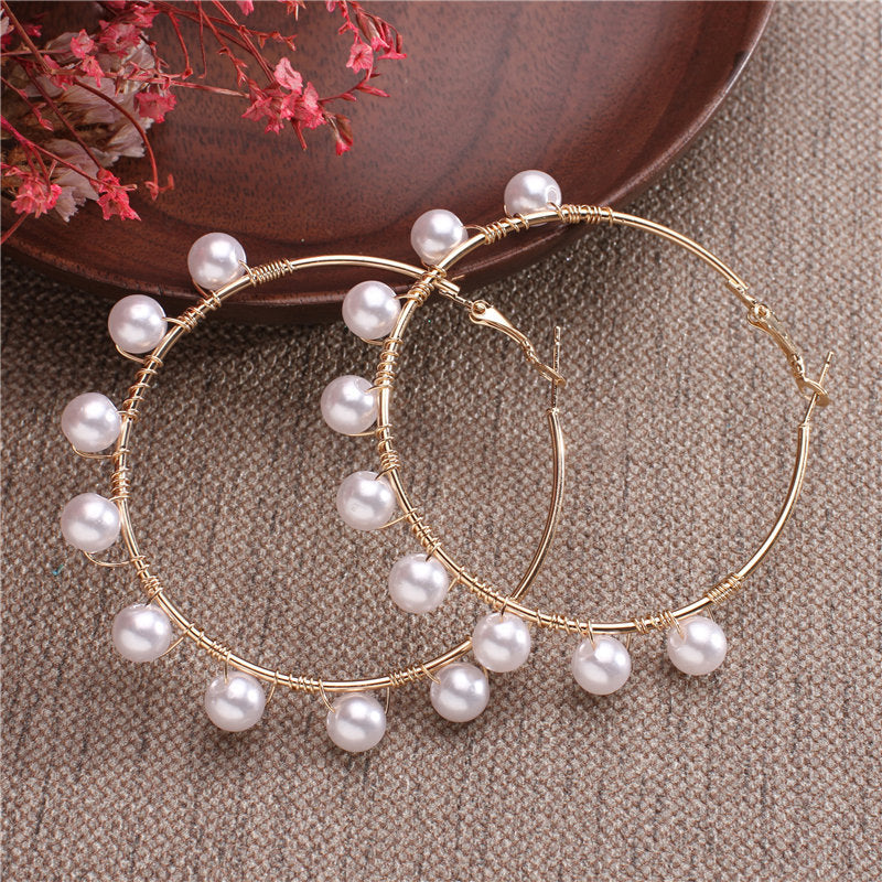 Pearls Wrapped Around The Earrings